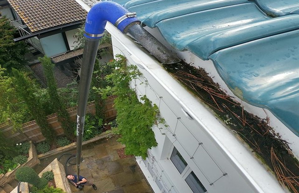 High-level gutter vacuum cleaning on a large Chesterfield property